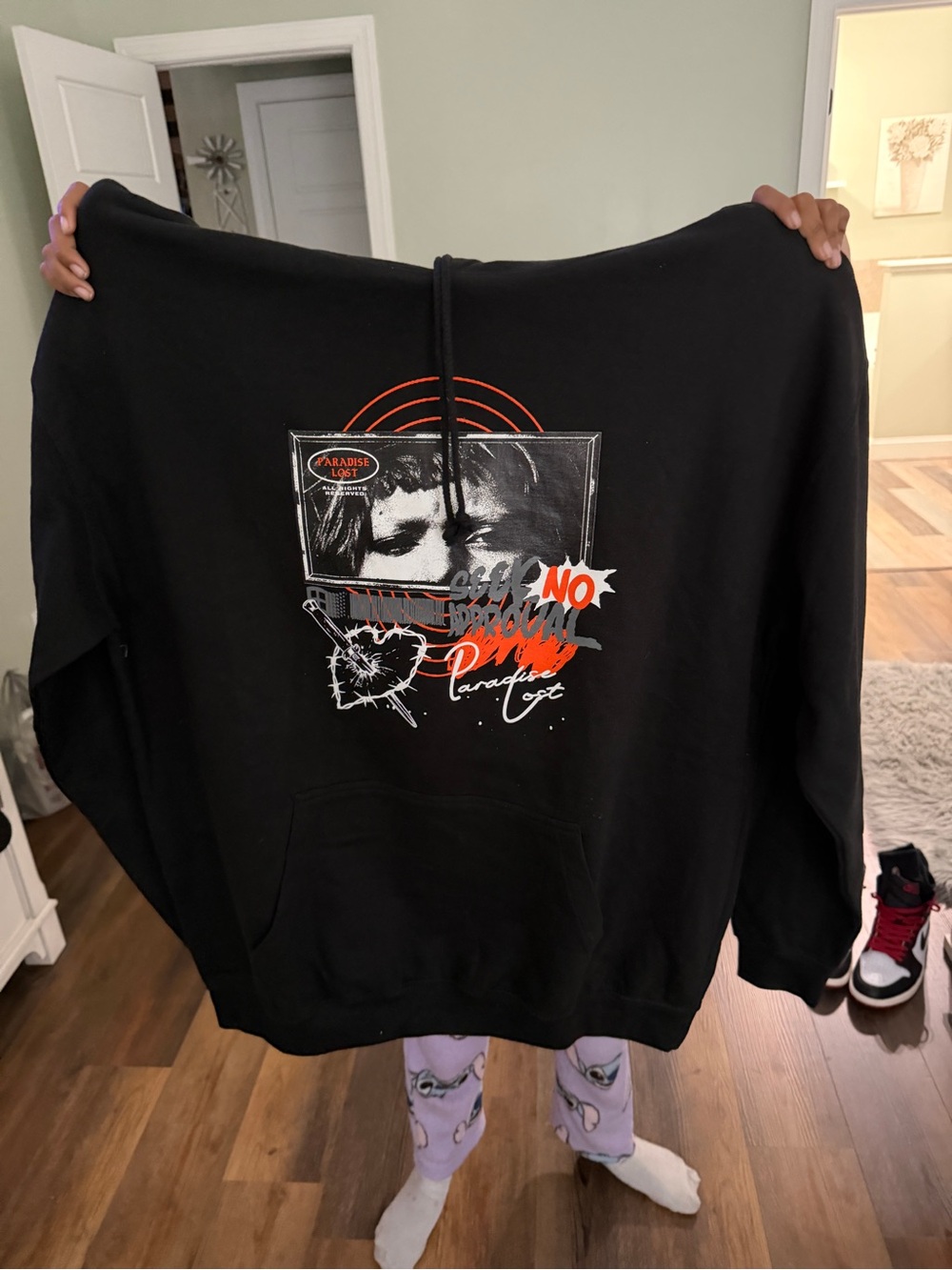 Black Graphic Hoodie with Red Accents